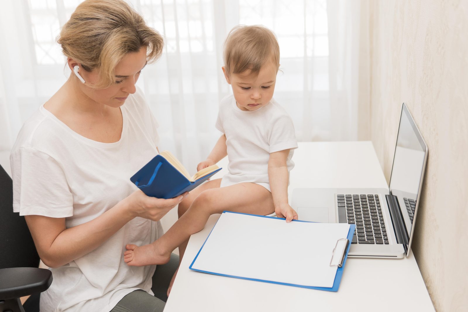 Parent planning birth certificate attestation timelines with a baby at the desk